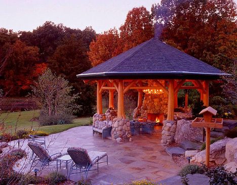 Log gazebo with fireplace inside